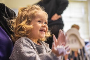 Cute child clapping