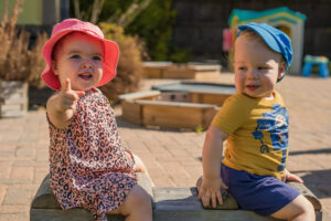 Young children playing outside