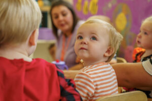 Cute child around dining table